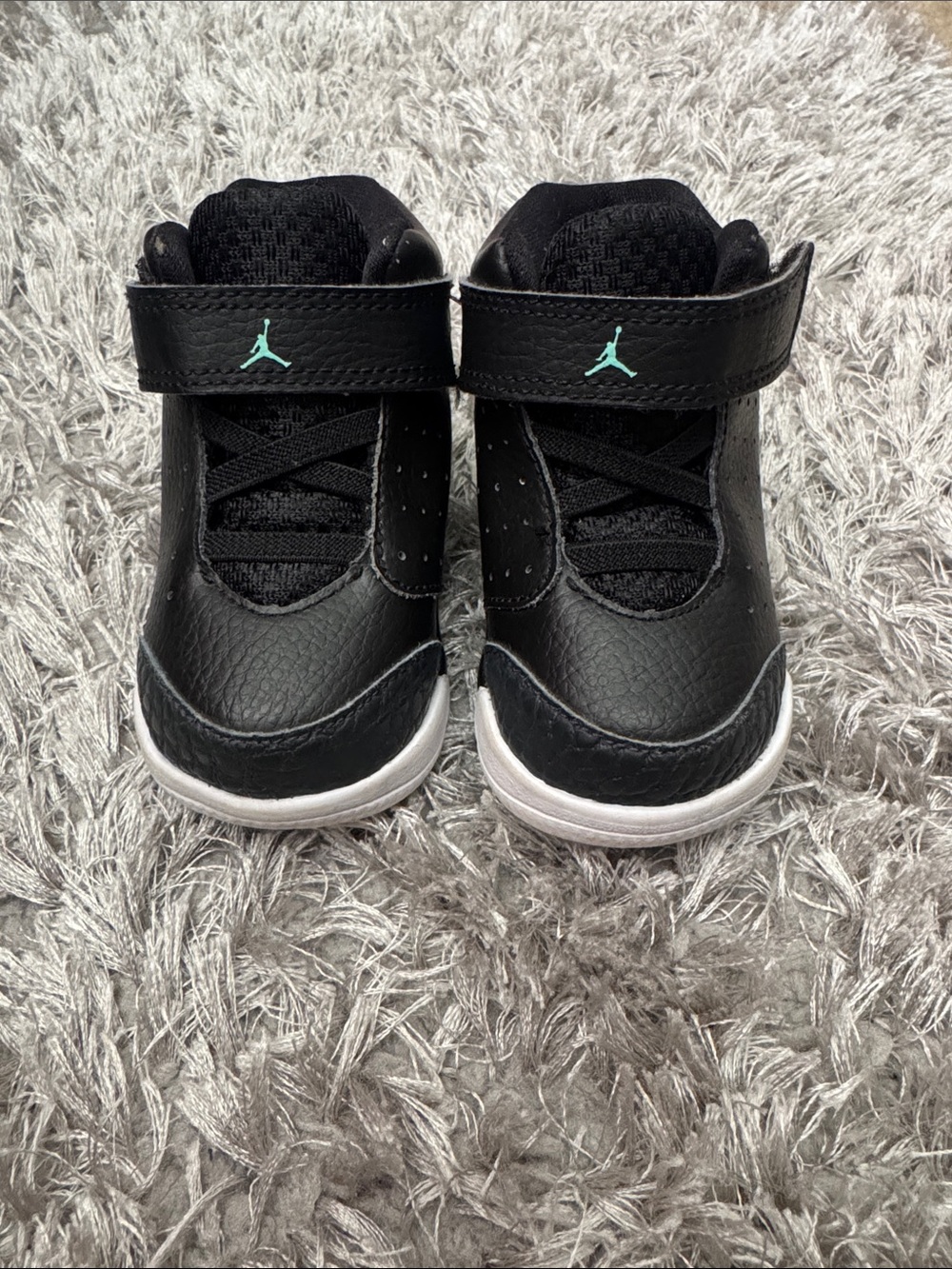 Jordan baby Black Sneakers with Teal. 5c. Used